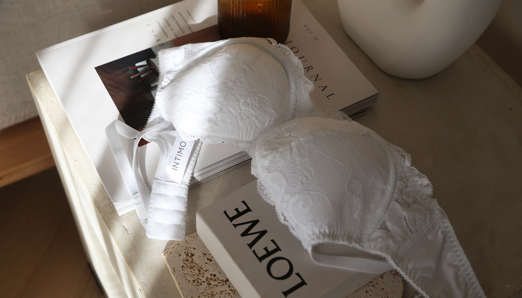 Bra and books; lifestyle photography by Erin Maxwell.